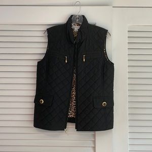 St. John Sport vest with gold hardware in perfect condition. Silk leopard lining